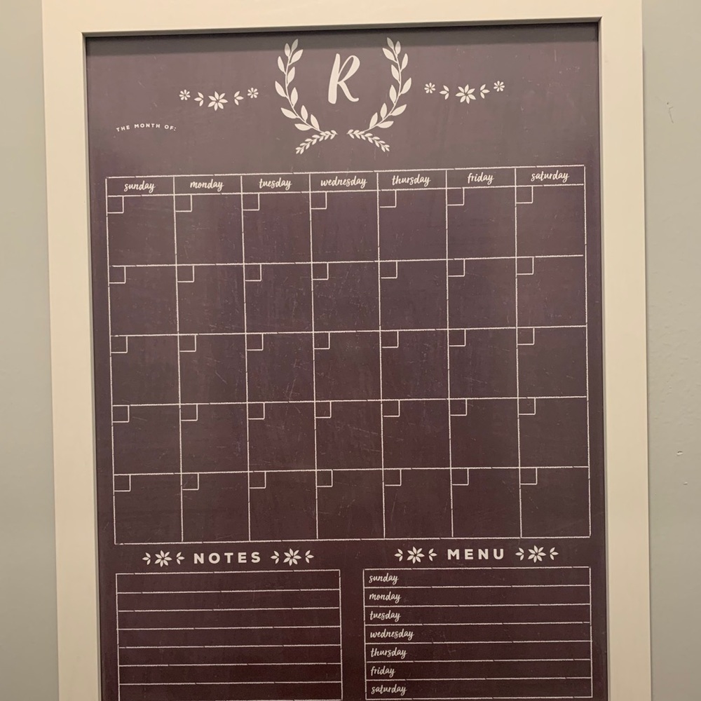 Chalkboard with monogram R at the top